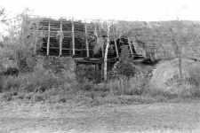 A roof on an old stone barn