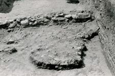 Fragment of the stone foundations of the collegiate church and a cluster of stones