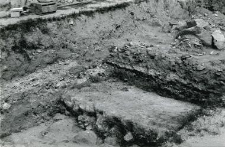 Lime mortar (charcoal pile?) At the fragments of stone foundations of the collegiate tower, from the south-east