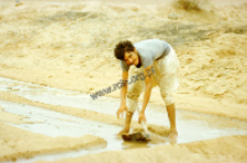 Portrait of a farmer in the field irrigation (Iconographic document)