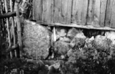A barn pillar on a stone