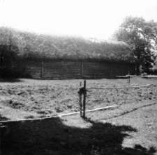 A post-and-plank barn