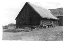 A post-and-plank barn