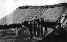 A half-pole, half-timbered barn