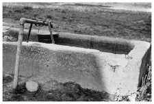 A well with a pump