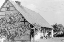 A residential building and a farm building