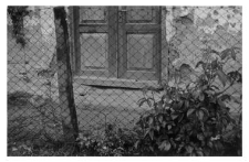 Residential building with walls covered with clay